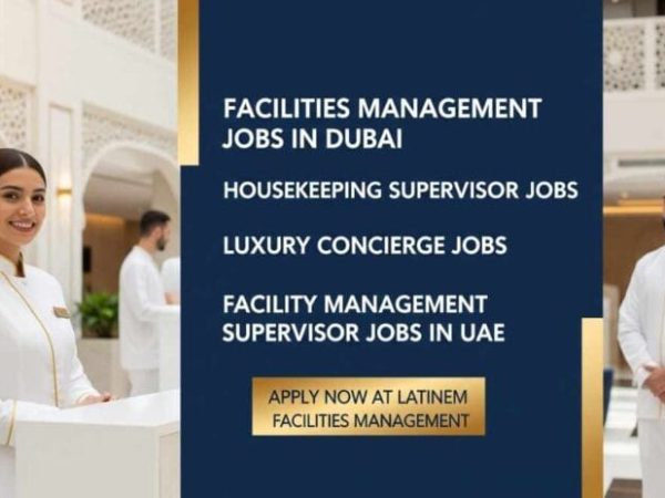 Indian HVAC technician performing maintenance on an air conditioning unit in a Dubai building.