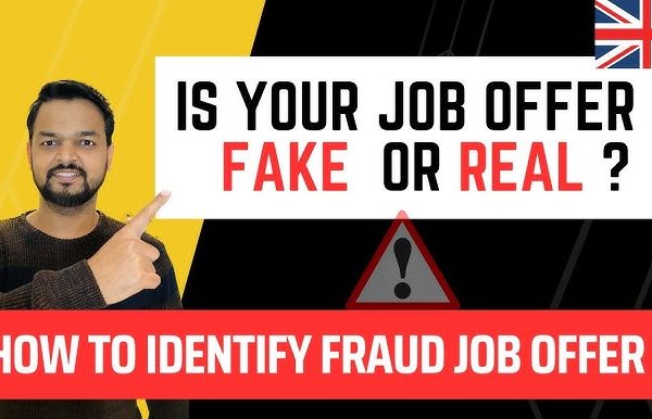 A person holding a magnifying glass over a suspicious employment contract with "SCAM" stamped on it.